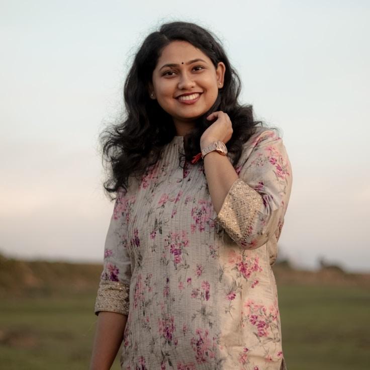 Portrait of Nova Rinaldi, group coordinator and fusion cooking expert